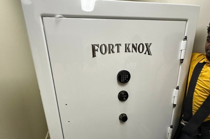 Pantheon Moving crew moving a Fort Knox gun safe using heavy-duty equipment in Kansas City
